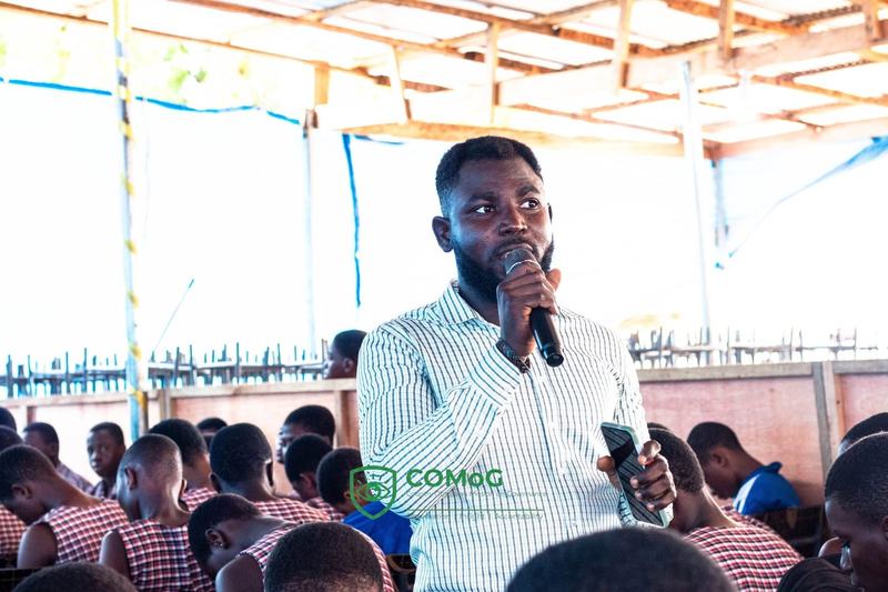 Roland Krabor addressing students on malaria prevention